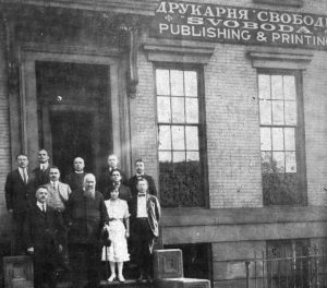 1921 UNA Employees gathered for group photo outside of old HQ building