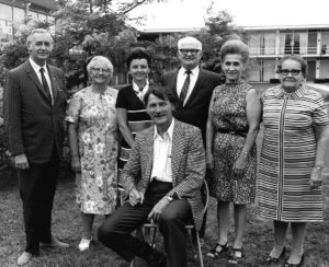 C-suite executives pose for group photo in 1970