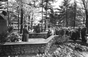 Members gathered around Taras Shevchenko bust at Soyuzivka during the 1975 UNA General Meeting