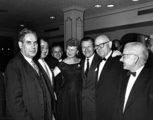 Group Photo of Men and Women at a celebration