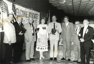 1986 UNA Delegates taking group photo with their plaques