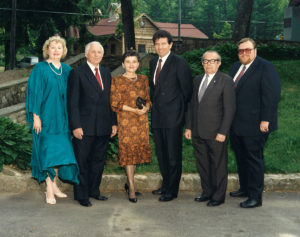 1990 UNA President taking group photo with members