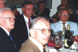 2005 UNA General Assembly Meeting people gathered at tables eating and drinking